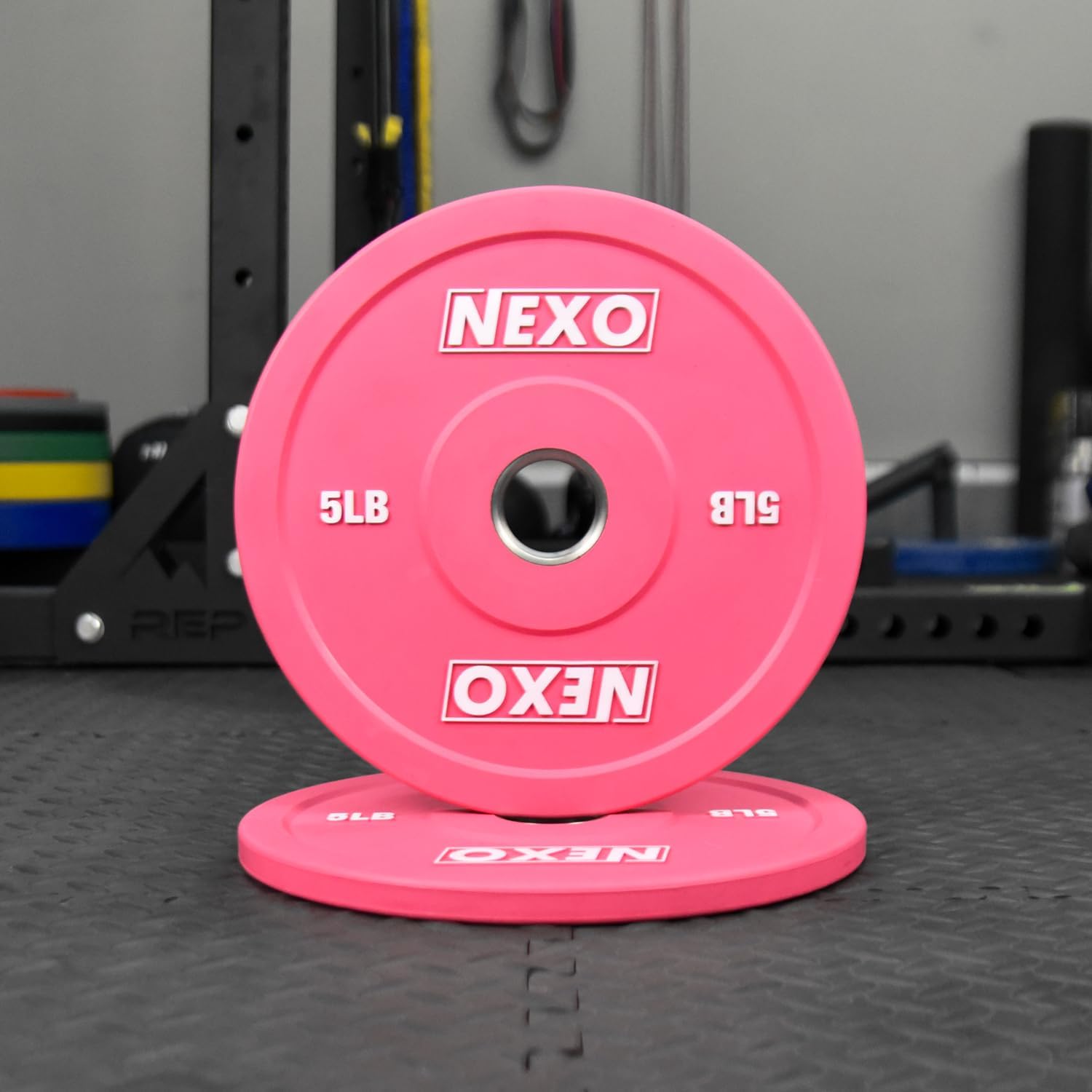 Par de Discos Olímpicos Recubiertos Color Rosa 5 Lb. - Imagen 3